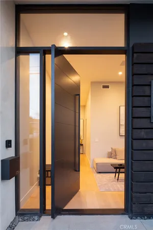 a view of a living room with a large window