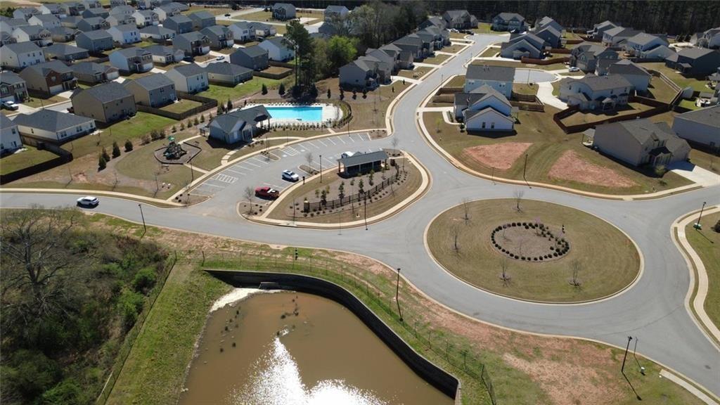 676 Whitman Lane Stockbridge, GA 30281 - Photo 40 of 50 an aerial view of a swimming pool a yard and outdoor seating