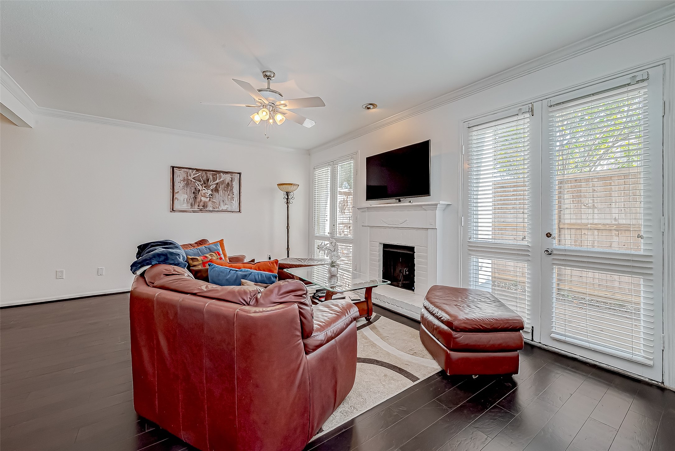 2100 Tanglewilde Street, Unit 189 Houston, TX 77063 - Photo 8 of 31 Family room with french doors to patio