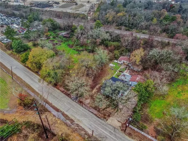 a view of a garden with an outdoor space