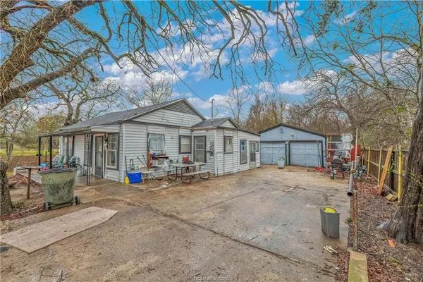 a view of a house with a patio