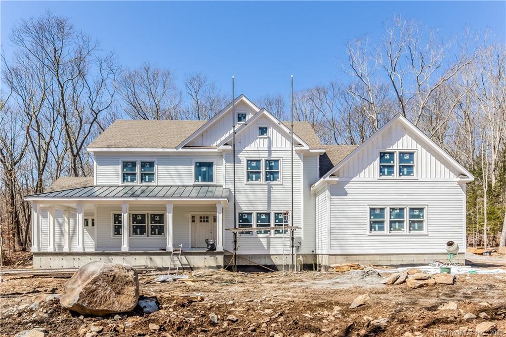 125 Summer Hill Road Madison, CT 06443 - Photo 1 of 1 a front view of a house with a yard