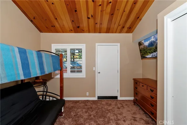 a bathroom with a sink a mirror and a shower