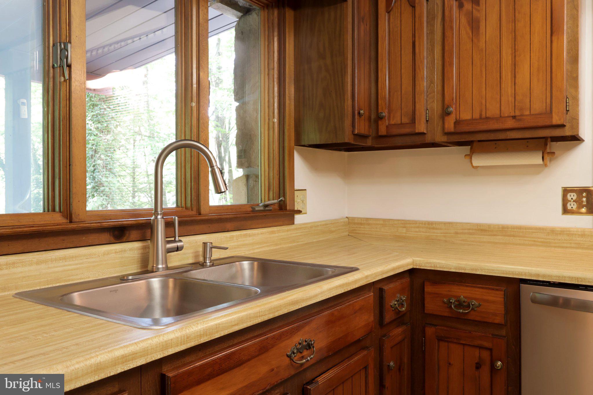 313 Jack Straw Road Julian, PA 16844 - Photo 38 of 69 Warm wooden accents in a cozy kitchen.