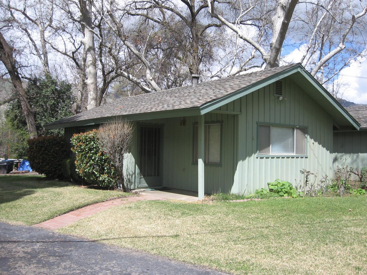 40658 Cherokee Oaks Drive Three Rivers, CA 93271 - Photo 18 of 25 a view of a house with a yard and garage