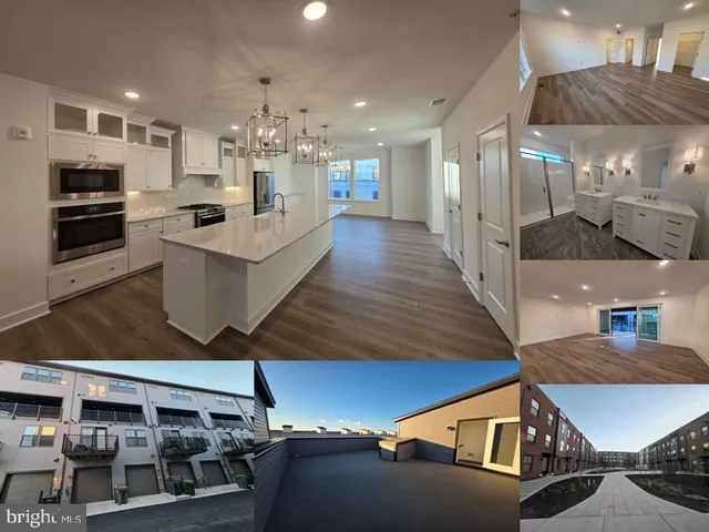 a lobby with furniture and a chandelier
