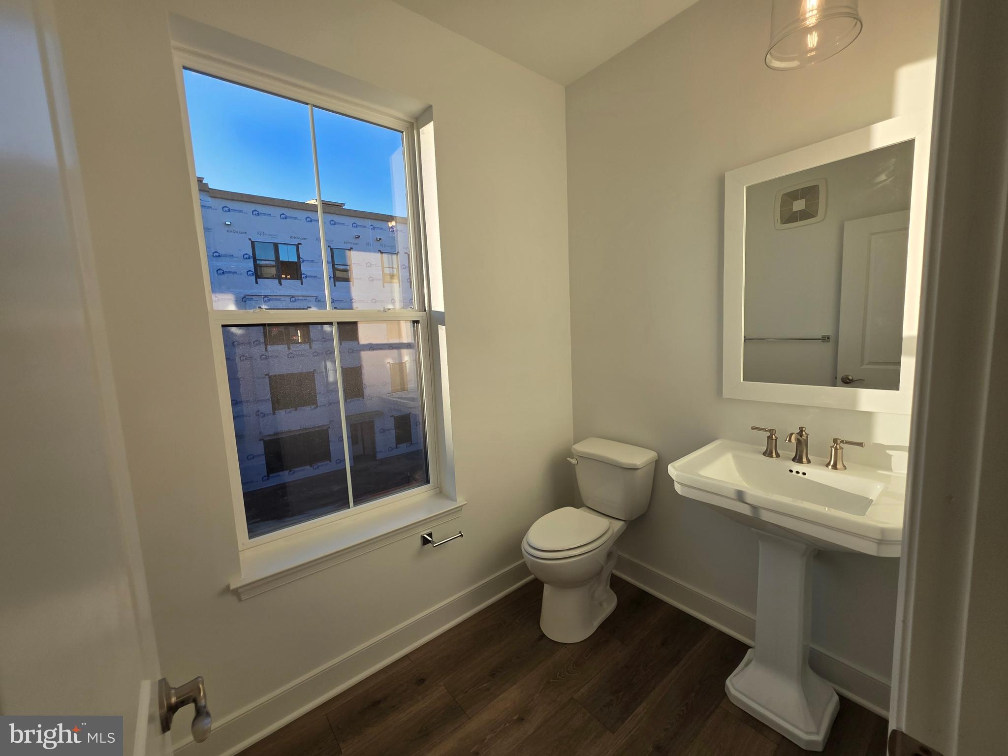 128 Locke Street, Unit B Baltimore, MD 21230 - Photo 27 of 49 a bathroom with a sink toilet and shower