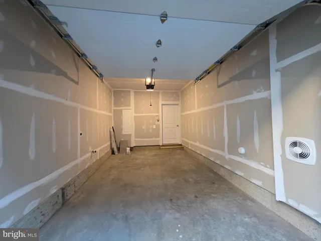 a view of a street with shops