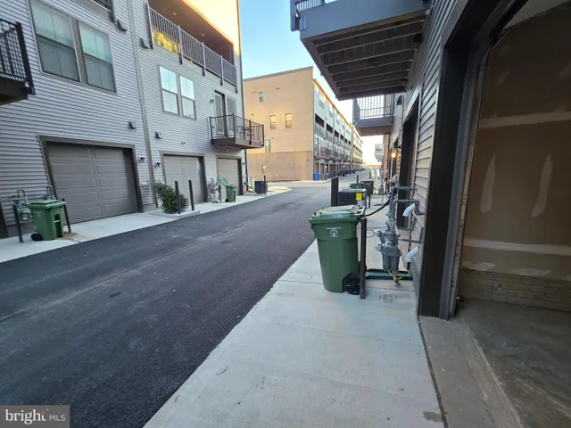 a view of a building with sitting area