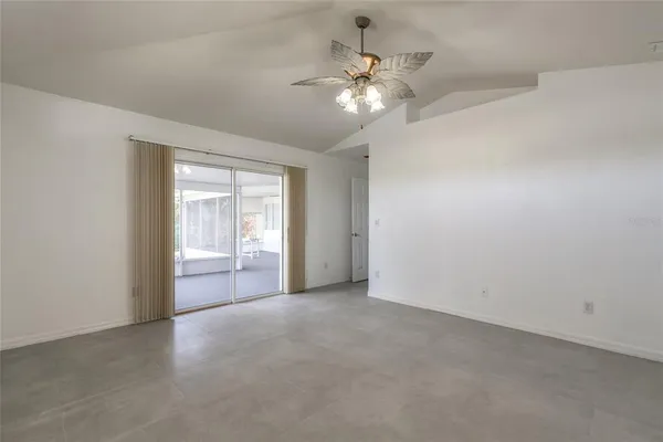 a view of an empty room and window