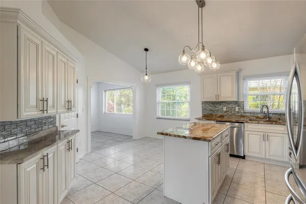 a view of room with window and pool table