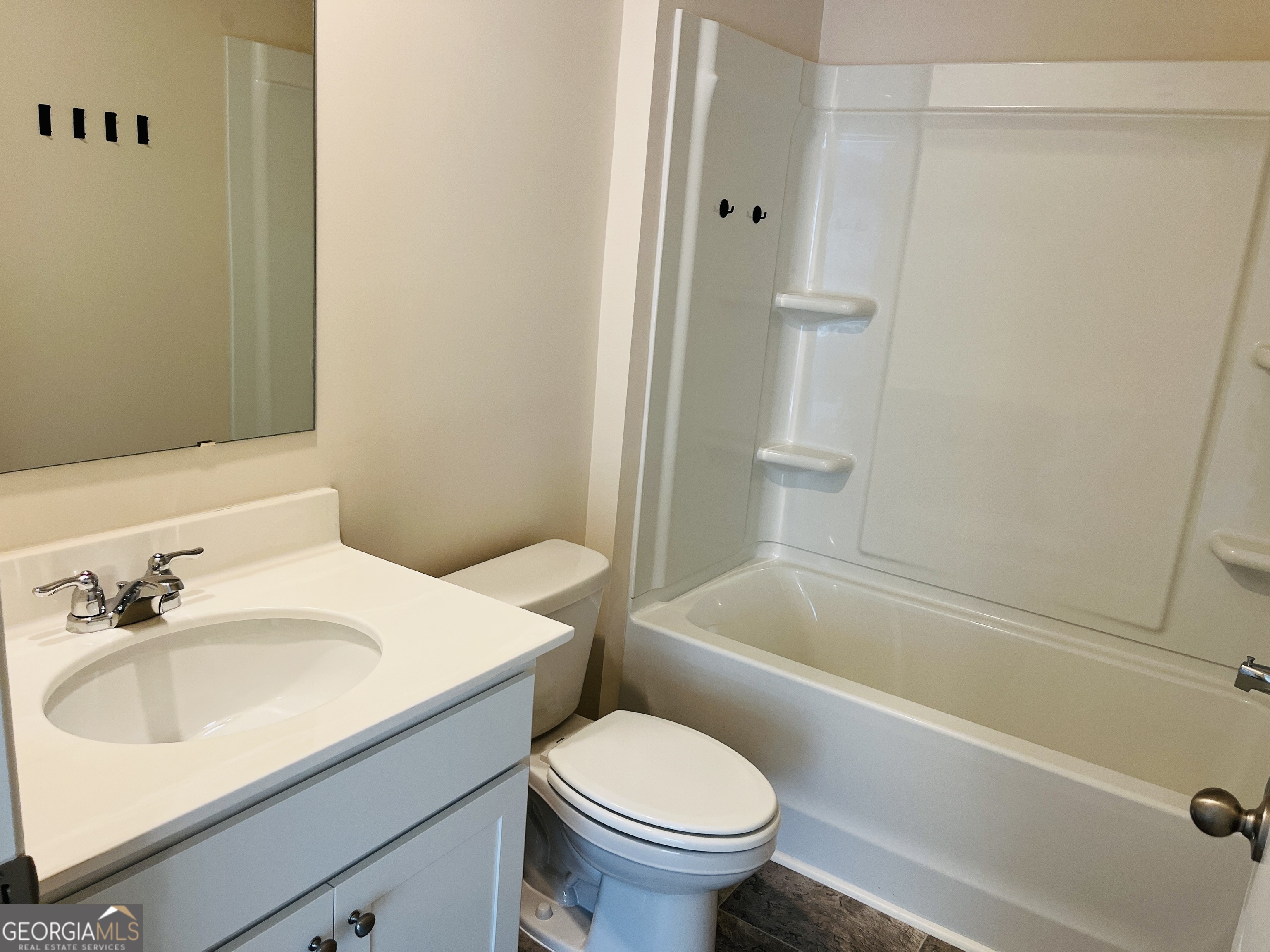 910 Sly Fox Run Fairburn, GA 30213 - Photo 28 of 46 a bathroom with a sink toilet and bathtub