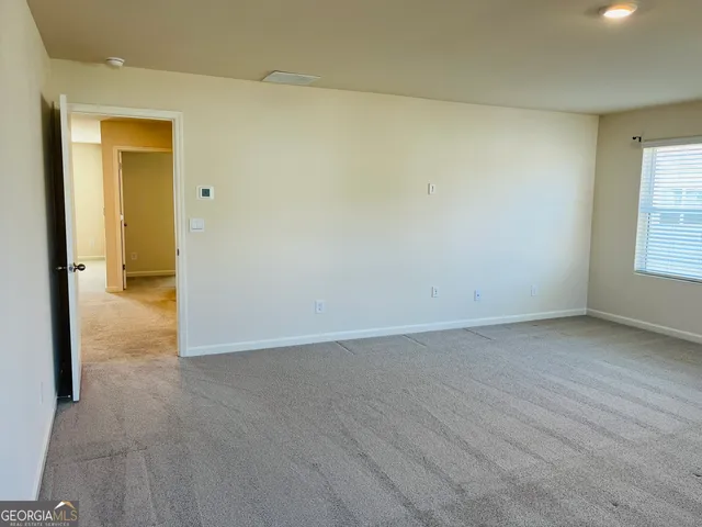 an empty room and window