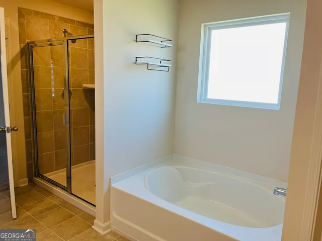 a bathroom with a bathtub