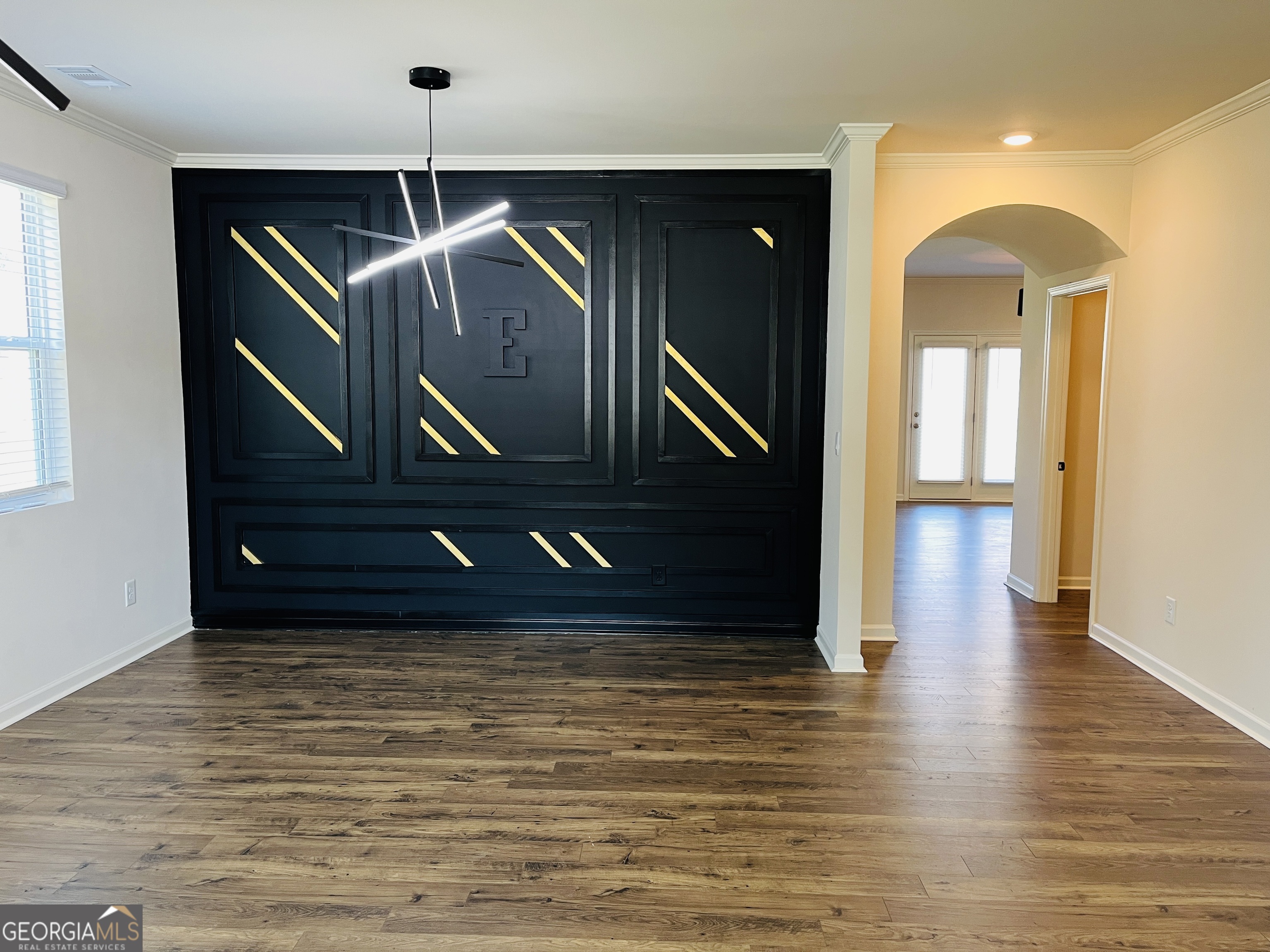 910 Sly Fox Run Fairburn, GA 30213 - Photo 4 of 46 a view of entryway with wooden floor