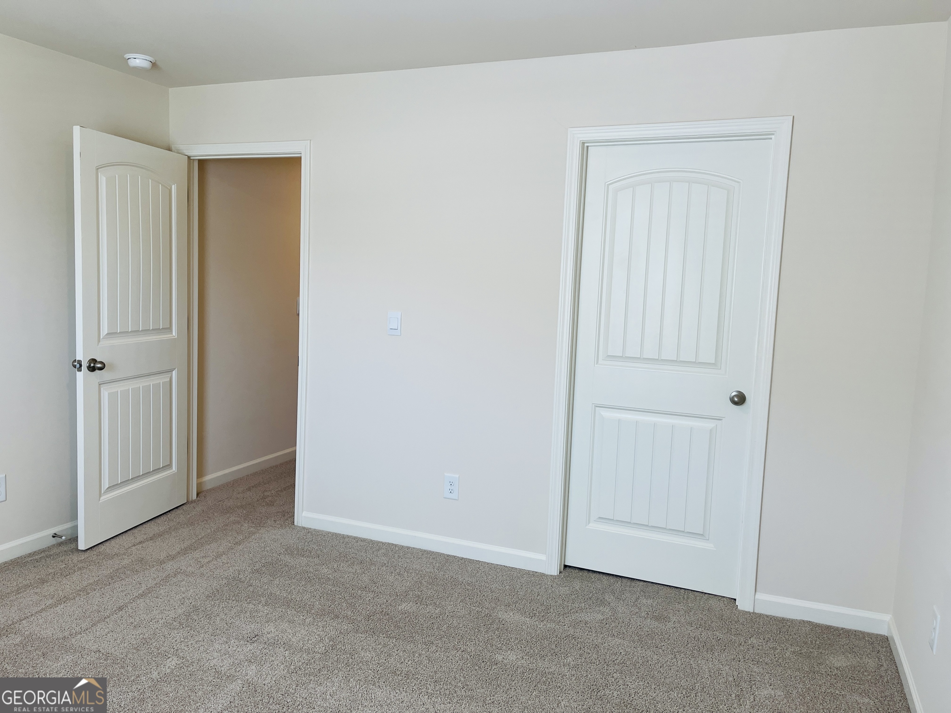 910 Sly Fox Run Fairburn, GA 30213 - Photo 41 of 46 an empty room with closet area
