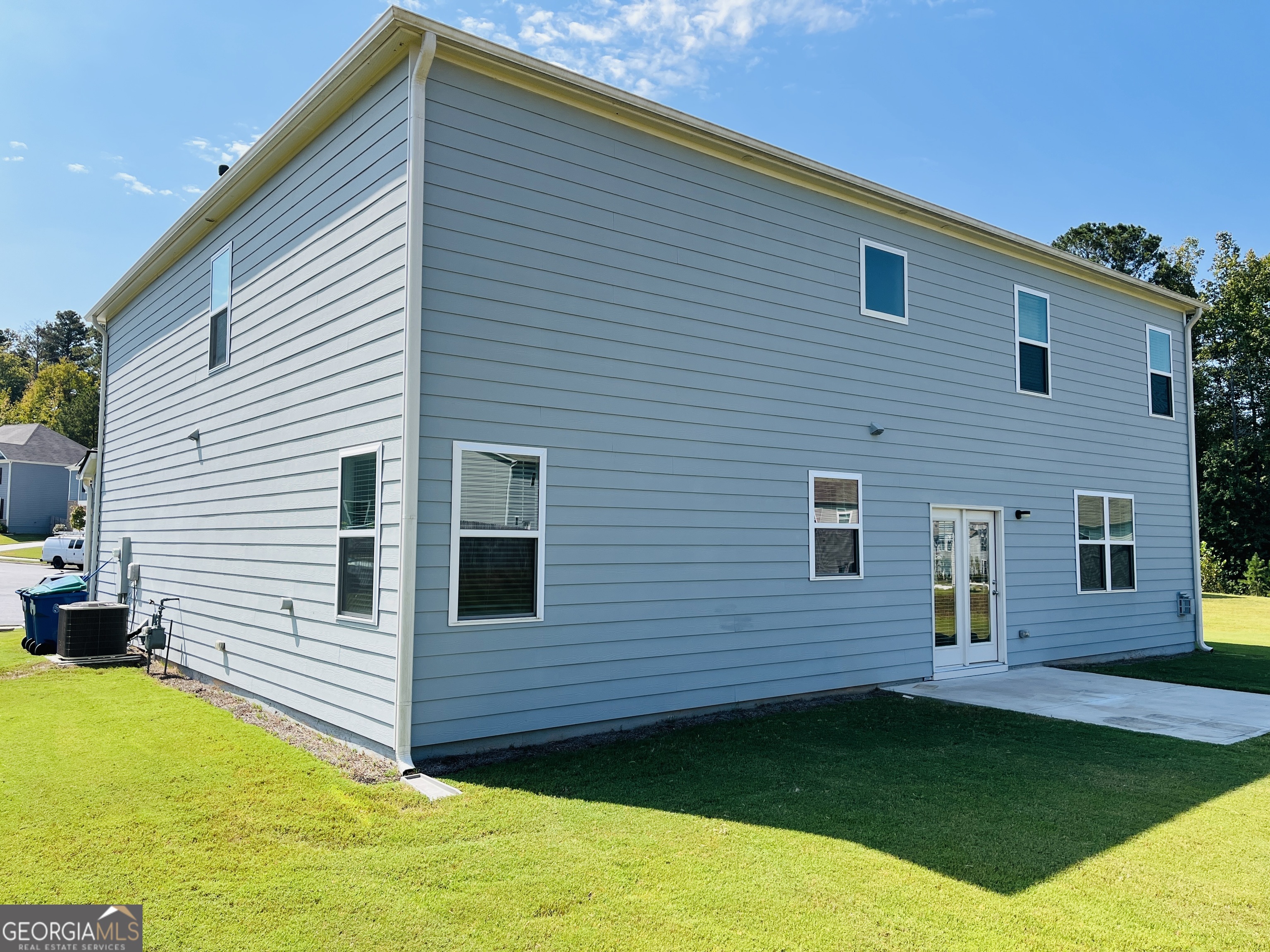 910 Sly Fox Run Fairburn, GA 30213 - Photo 44 of 46 a view of a backyard with a garden