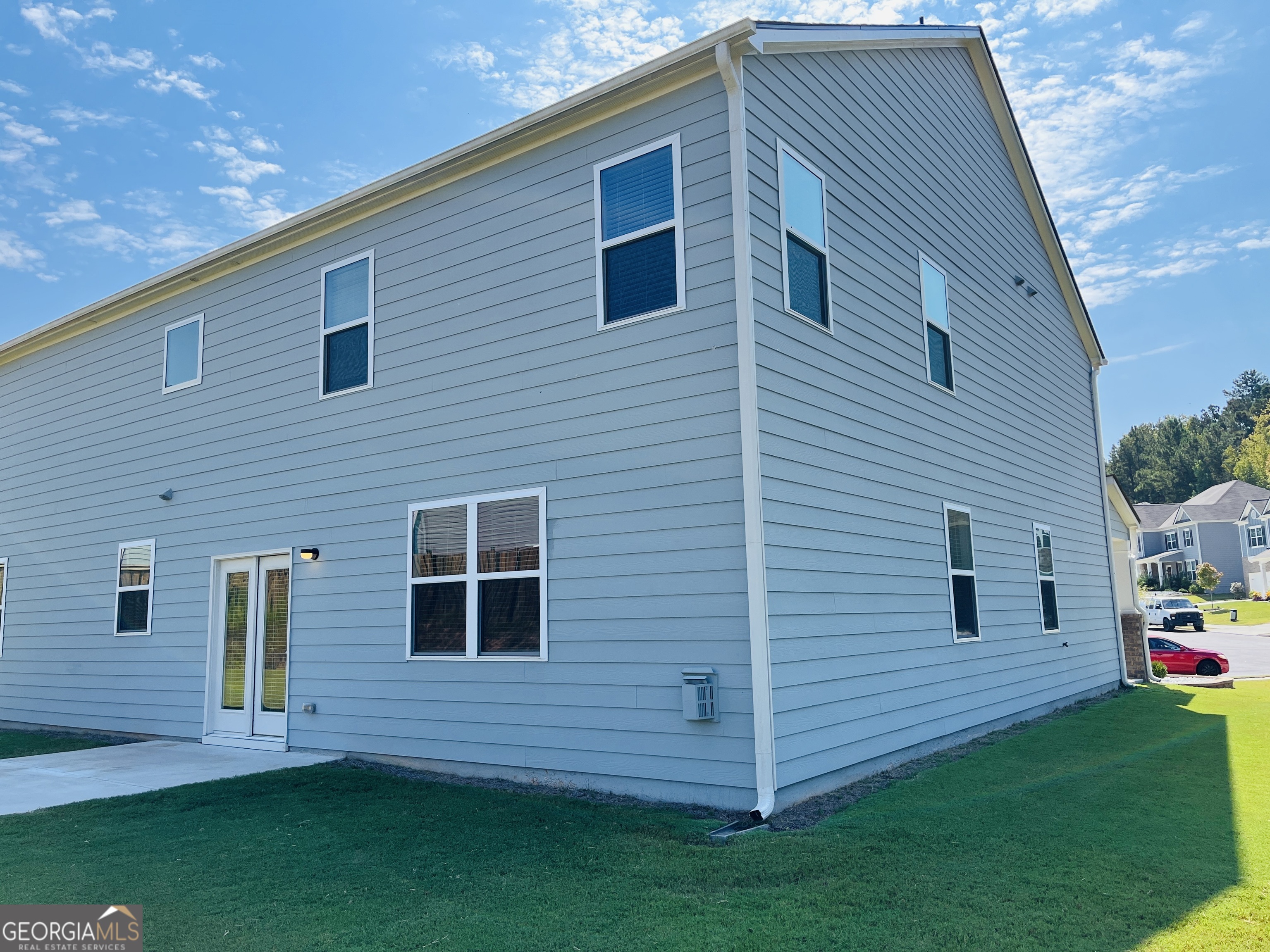 910 Sly Fox Run Fairburn, GA 30213 - Photo 46 of 46 a front view of a house with garden