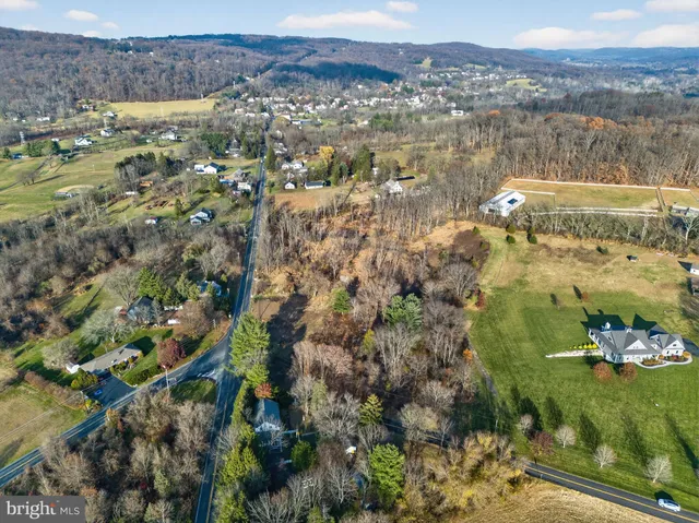 a view of a lake with mountains in the background