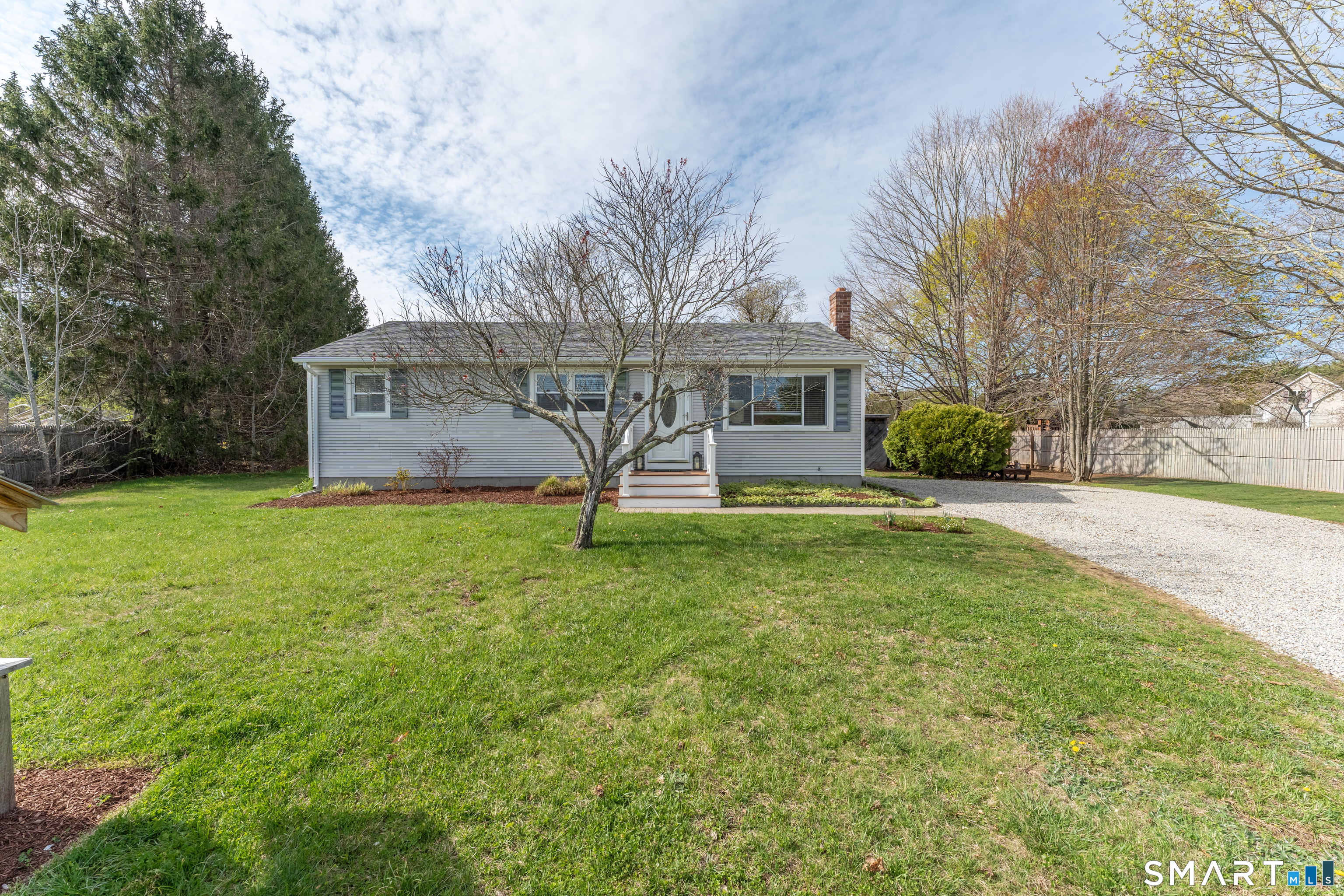 14 Liberty Lane Thompson, CT 06277 - Photo 1 of 39 a front view of house with yard and green space