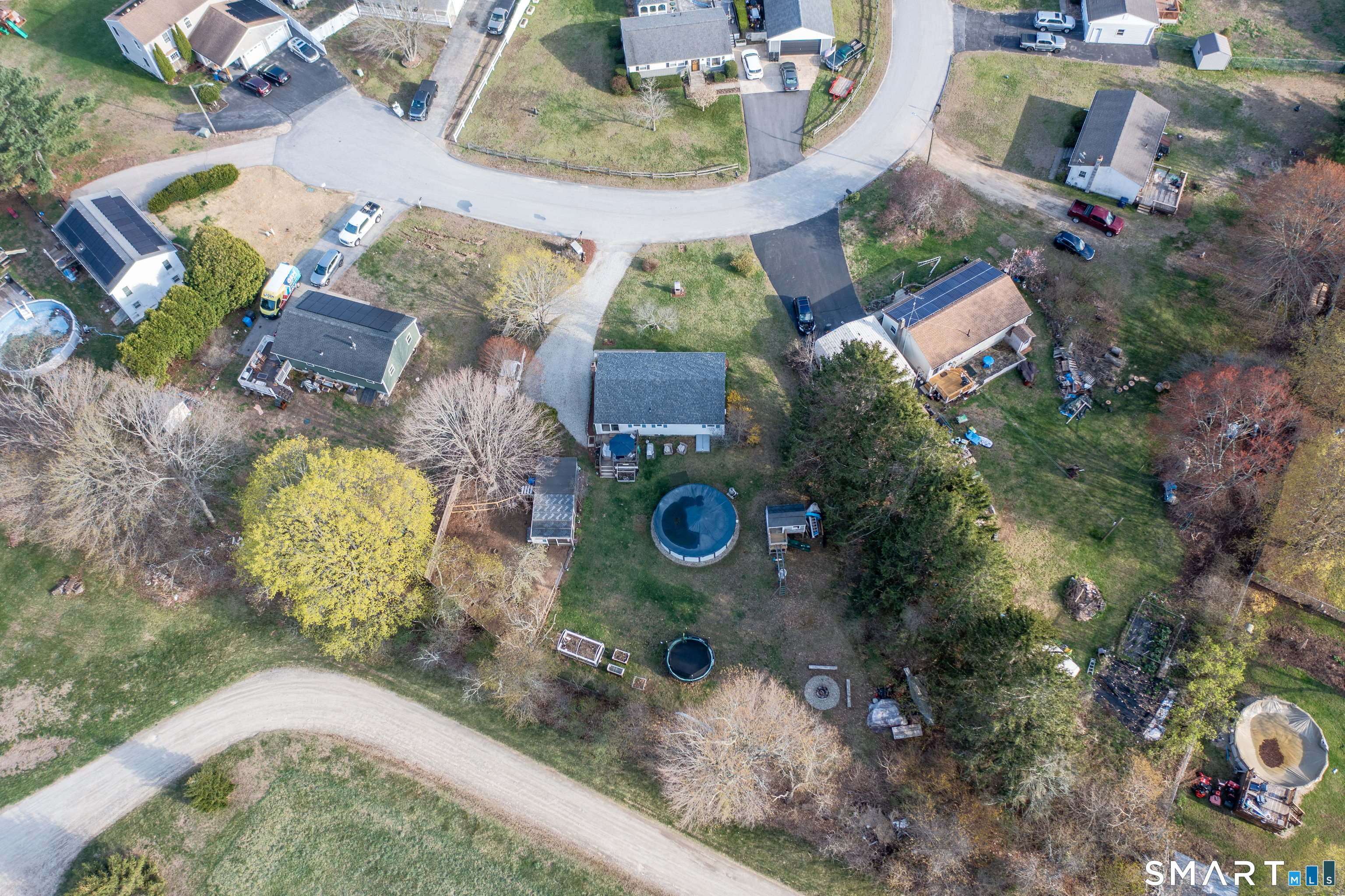14 Liberty Lane Thompson, CT 06277 - Photo 3 of 39 an aerial view of a house with a yard and a large tree