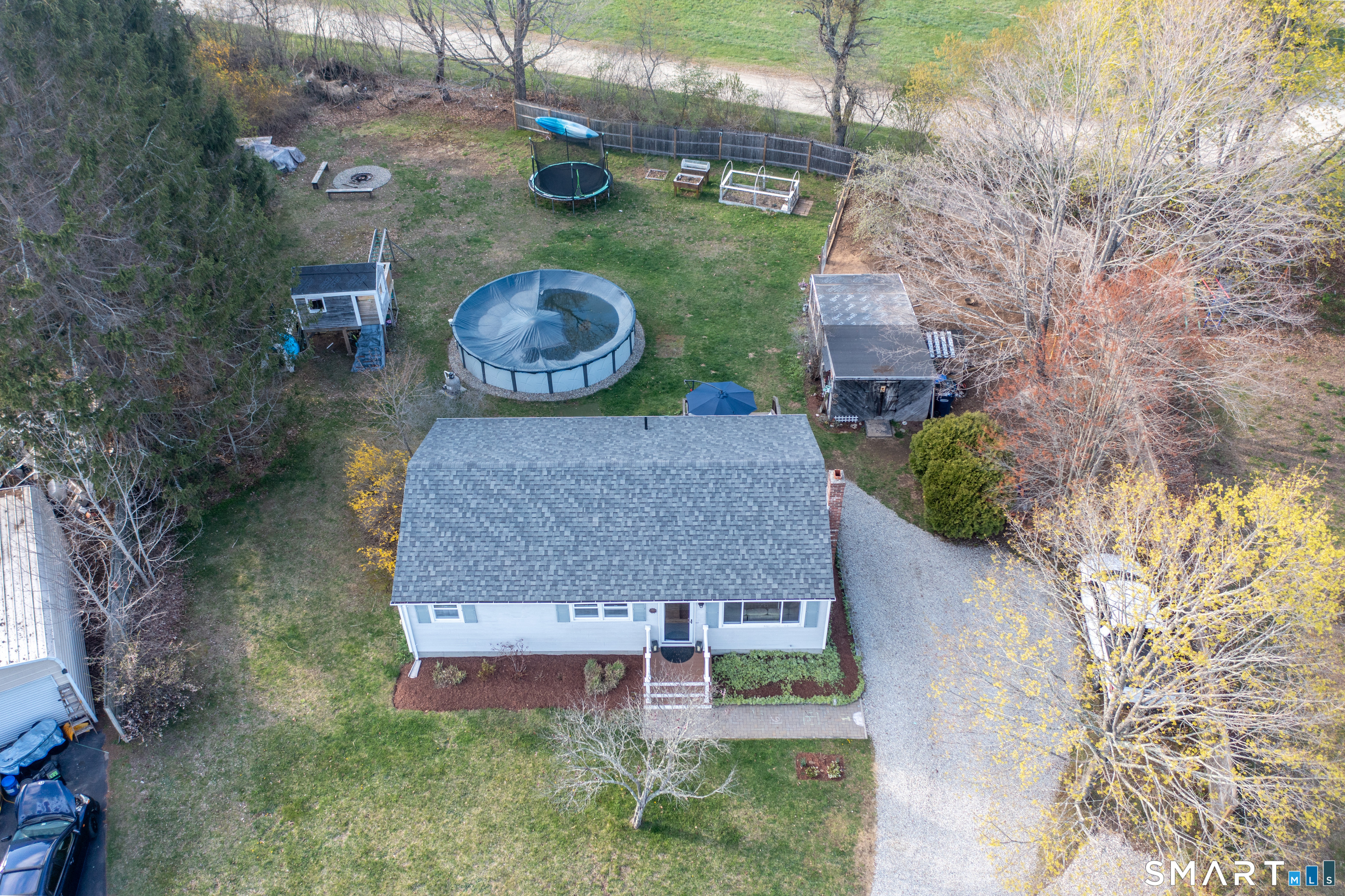 14 Liberty Lane Thompson, CT 06277 - Photo 5 of 39 a aerial view of a house with garden space and street view