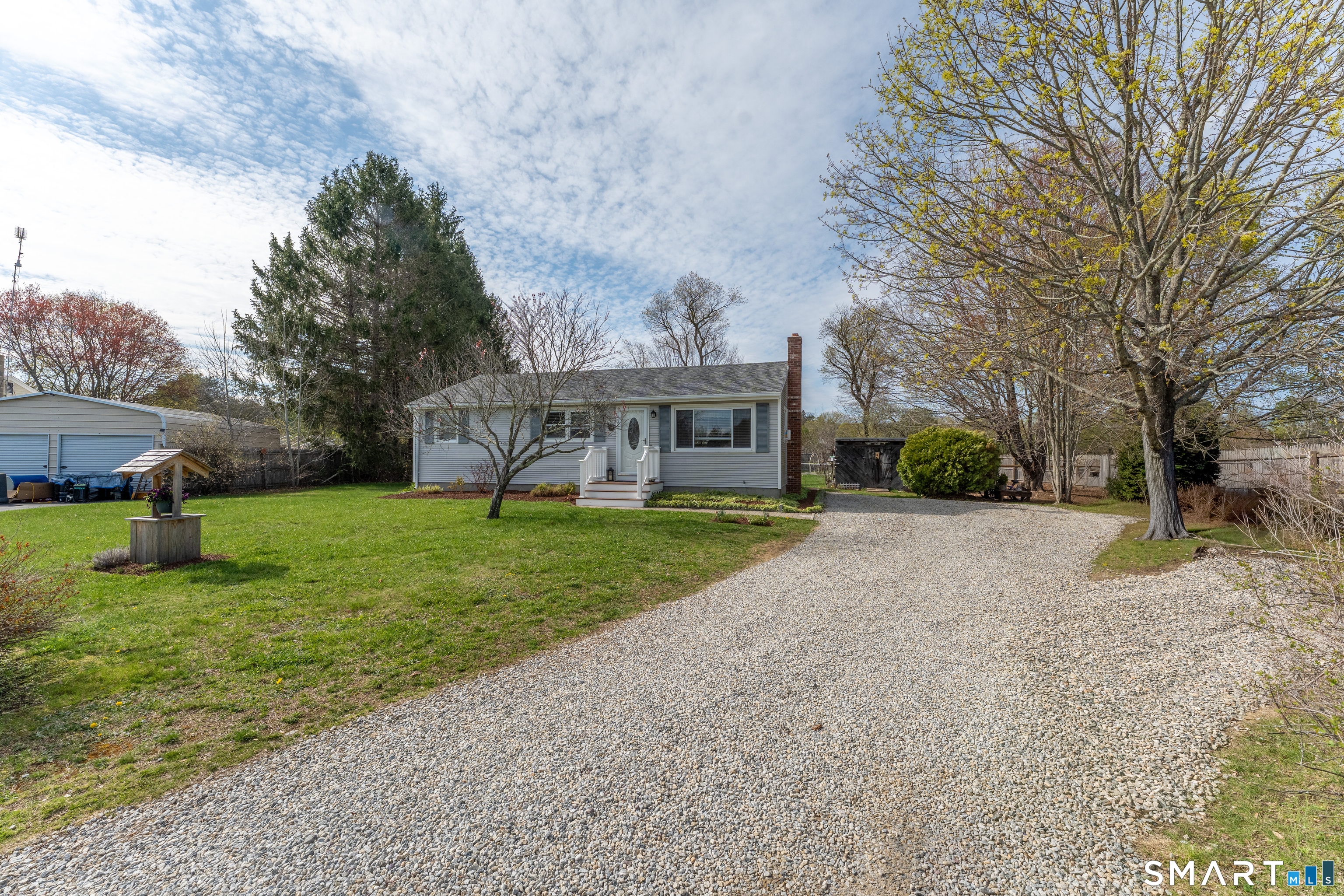 14 Liberty Lane Thompson, CT 06277 - Photo 6 of 39 a view of a house with backyard and a tree