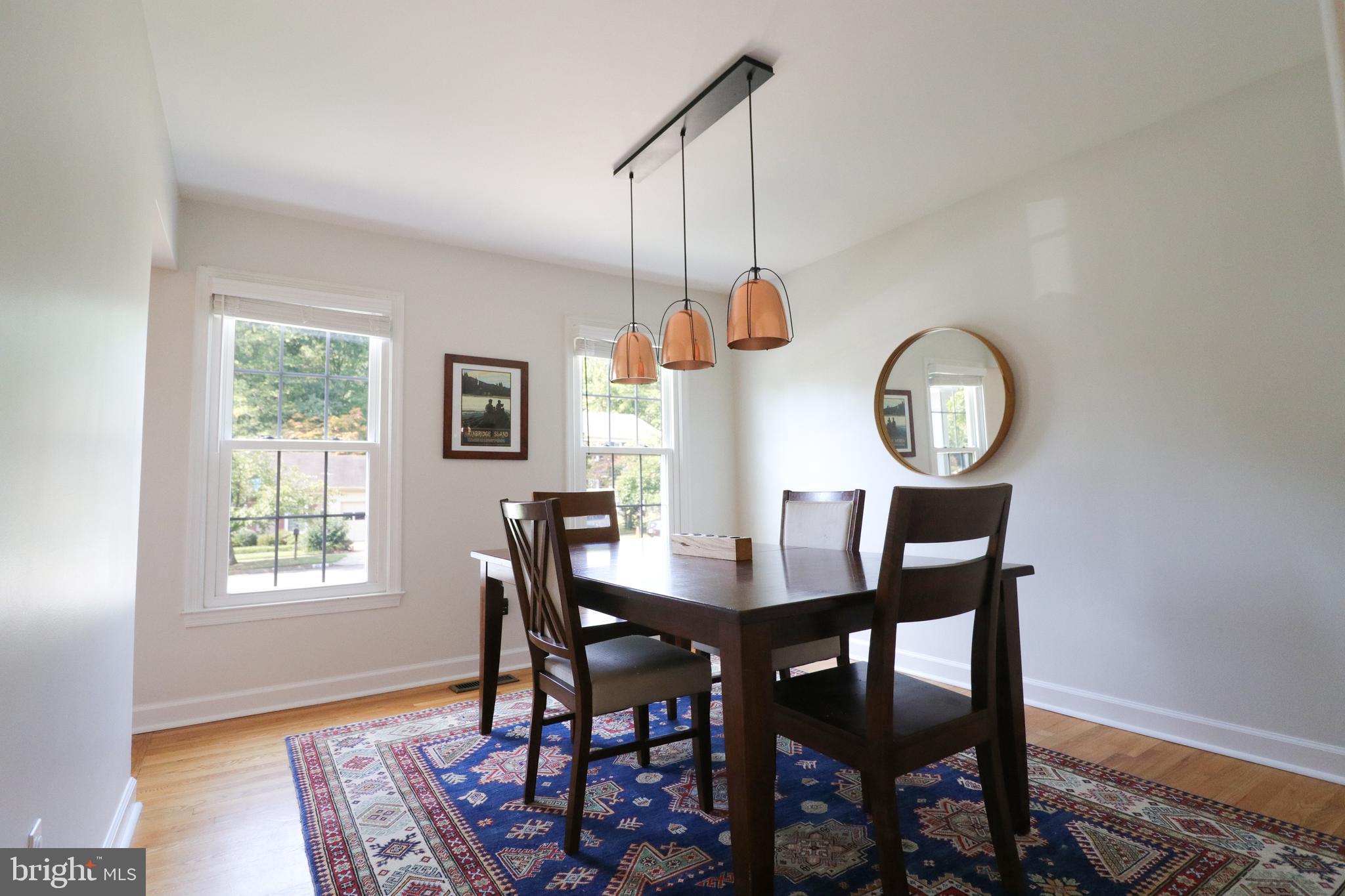 9320 Winbourne Road Burke, VA 22015 - Photo 20 of 55 Dining room with striking copper light fixture.