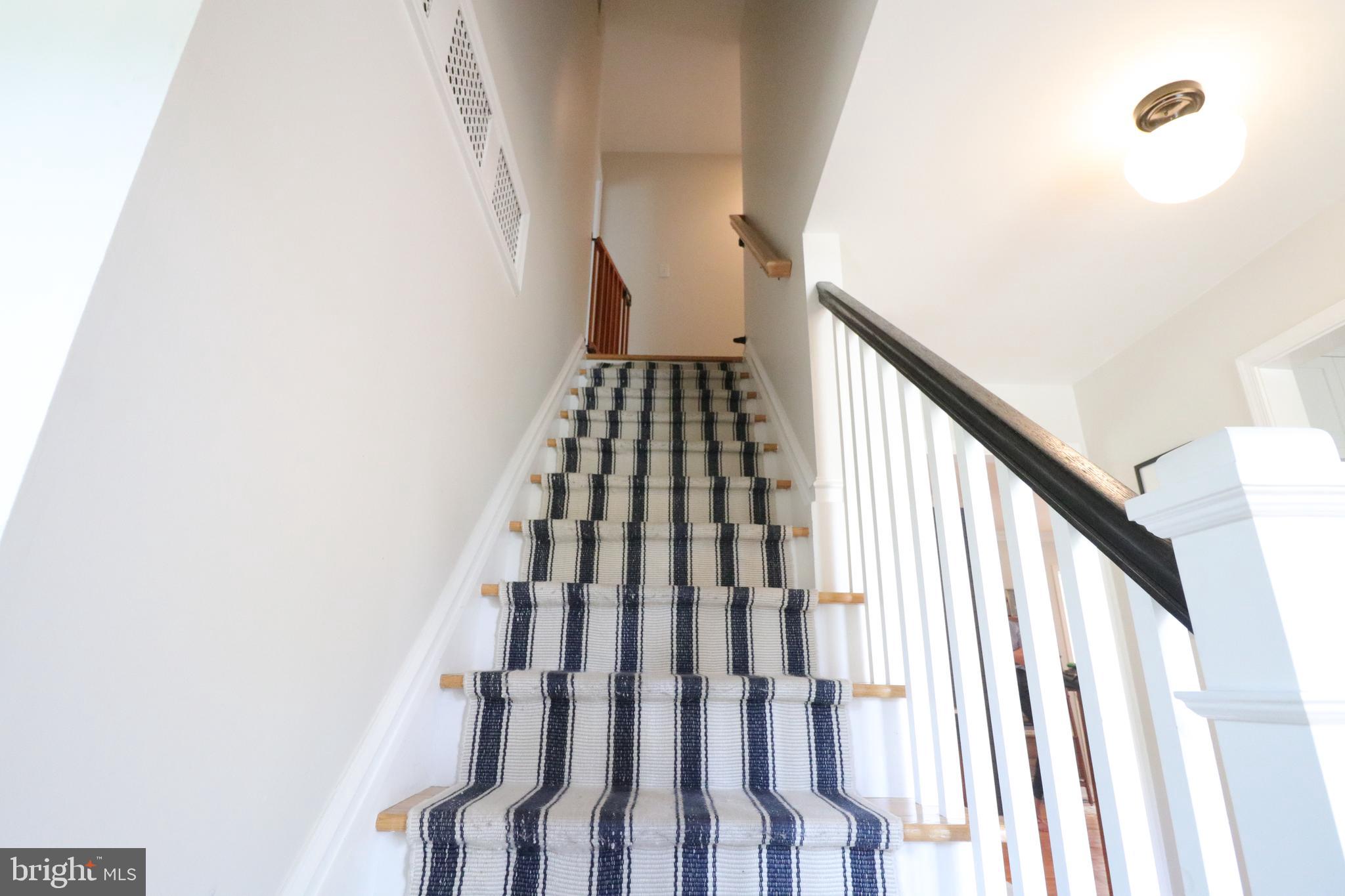 9320 Winbourne Road Burke, VA 22015 - Photo 24 of 55 Updated stair railing, post and balusters.