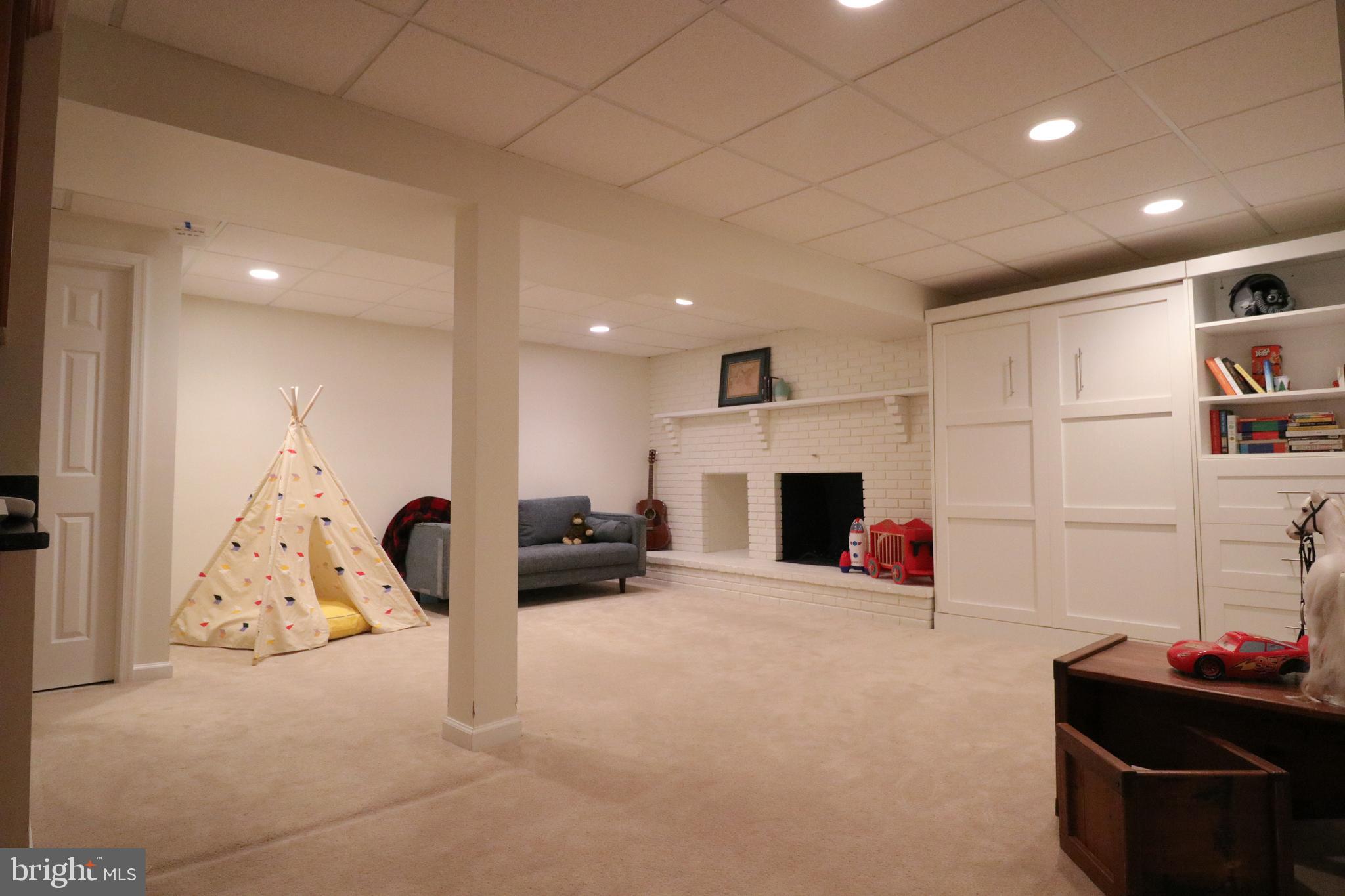 9320 Winbourne Road Burke, VA 22015 - Photo 40 of 55 Basement rec room.