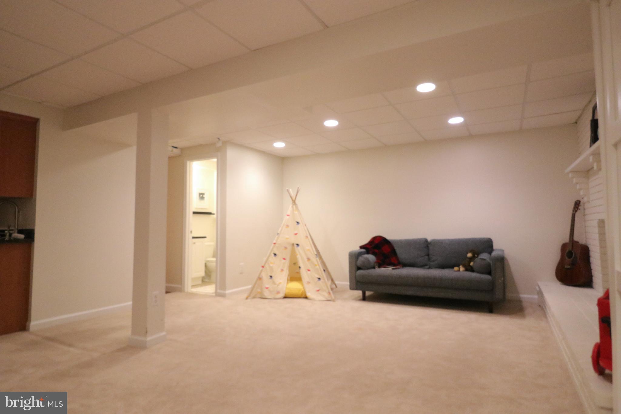 9320 Winbourne Road Burke, VA 22015 - Photo 42 of 55 Lots of hang out space and half bath.