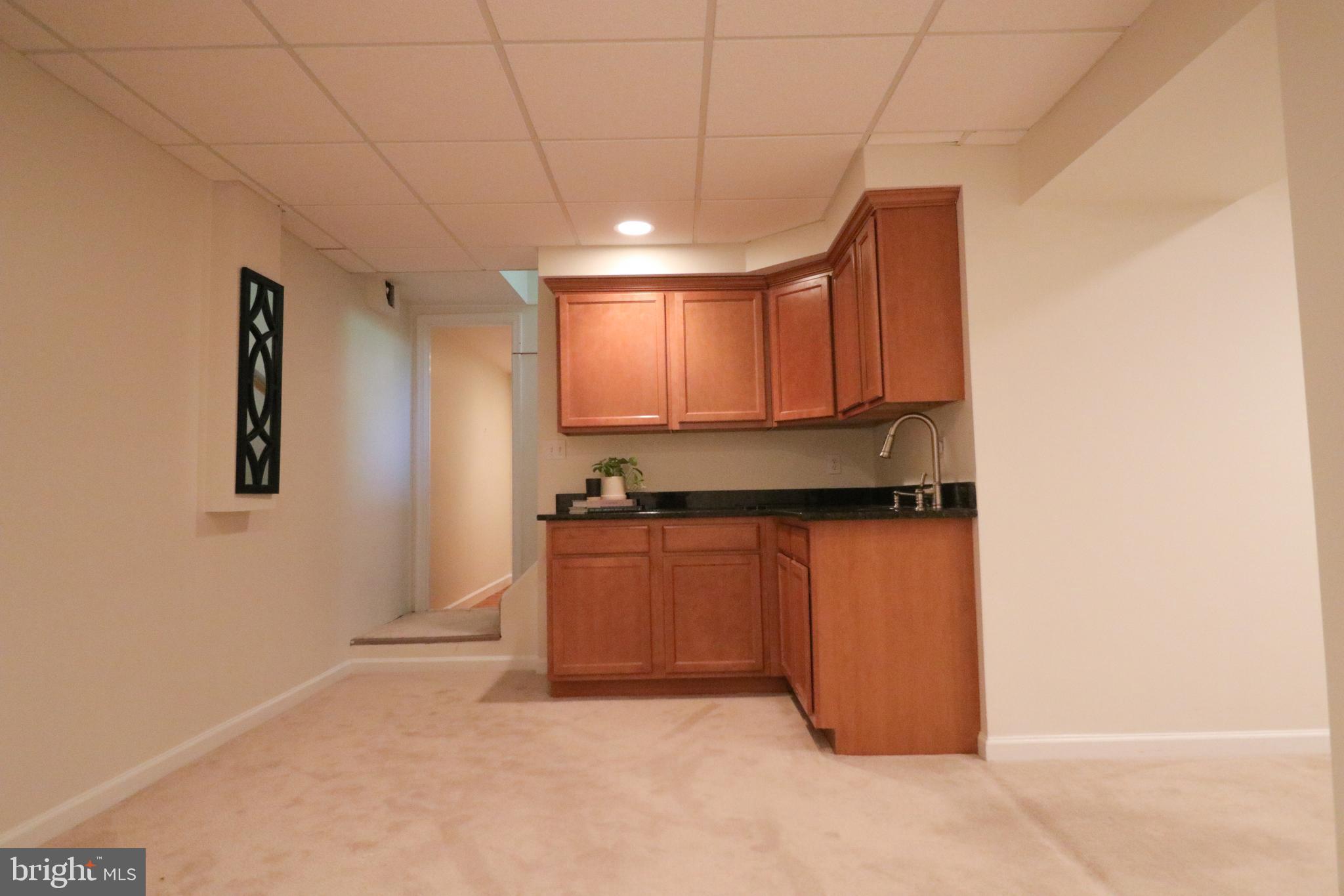 9320 Winbourne Road Burke, VA 22015 - Photo 43 of 55 Basement wet bar.
