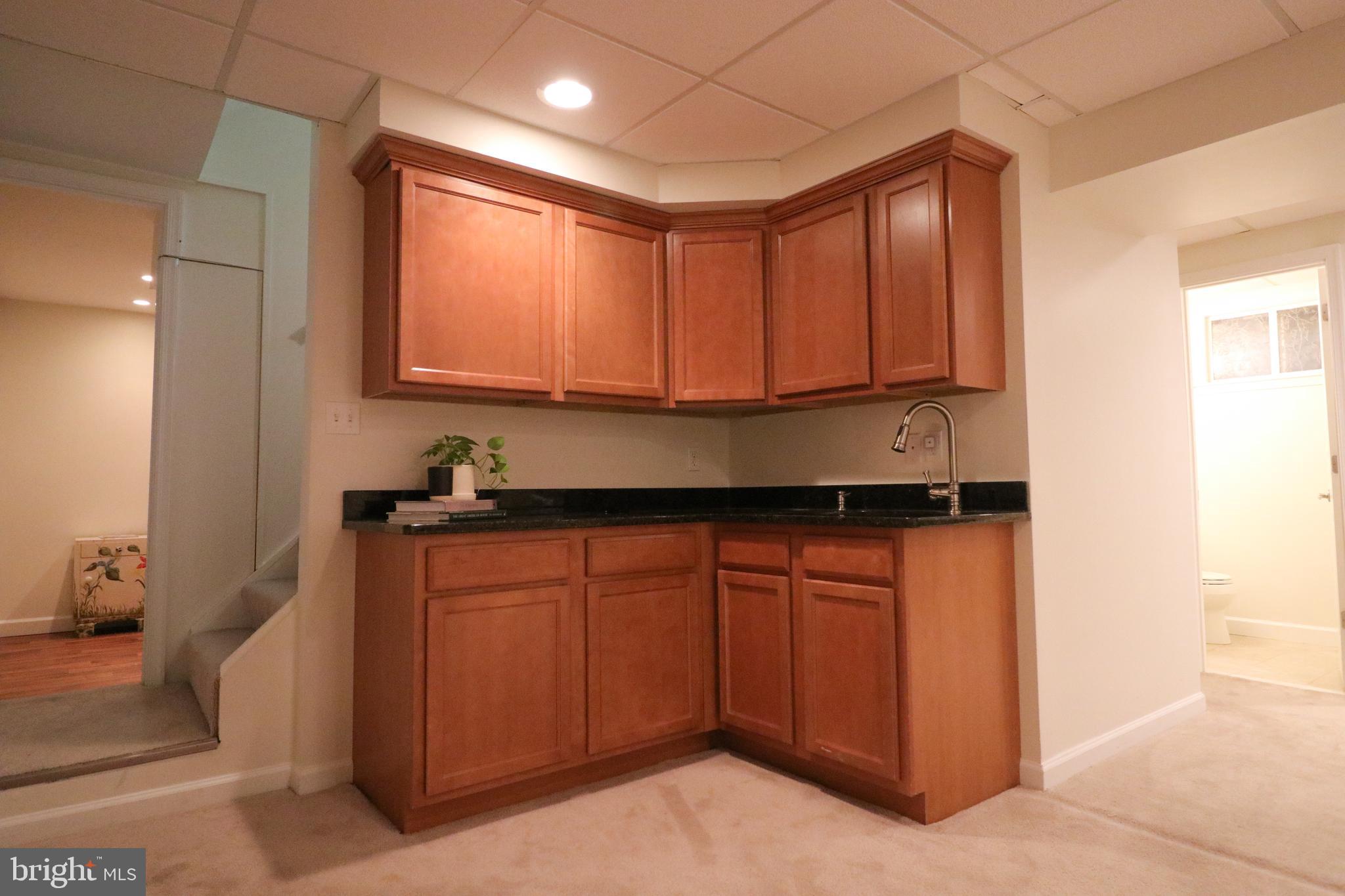 9320 Winbourne Road Burke, VA 22015 - Photo 44 of 55 Built in cabinets and granite countertops.