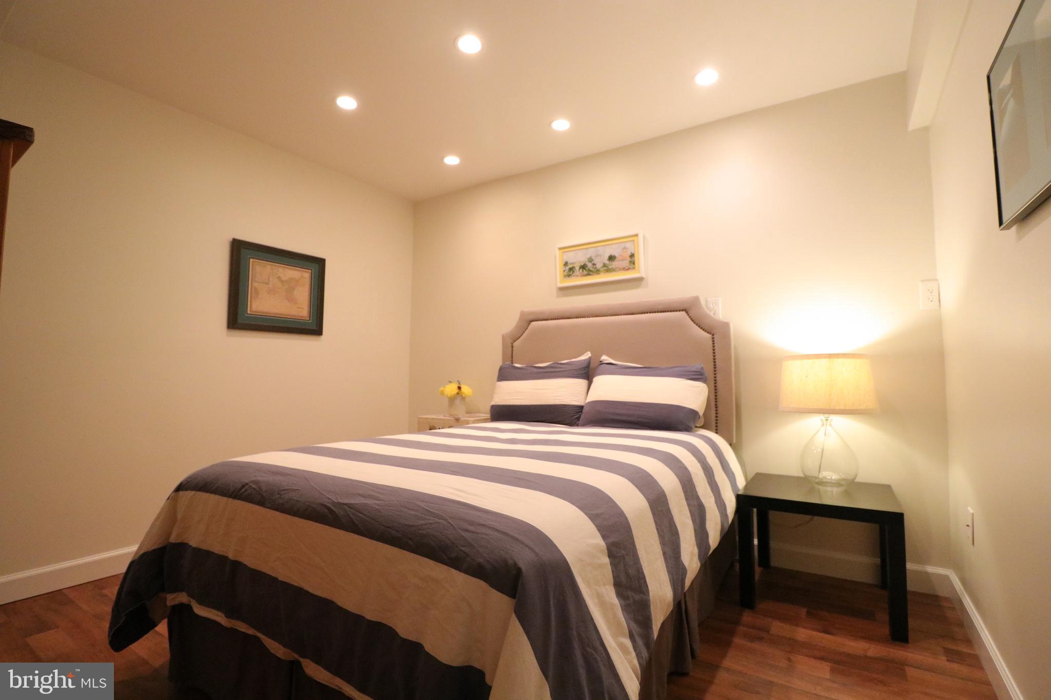 9320 Winbourne Road Burke, VA 22015 - Photo 46 of 55 Inset lighting and vinyl plank flooring.
