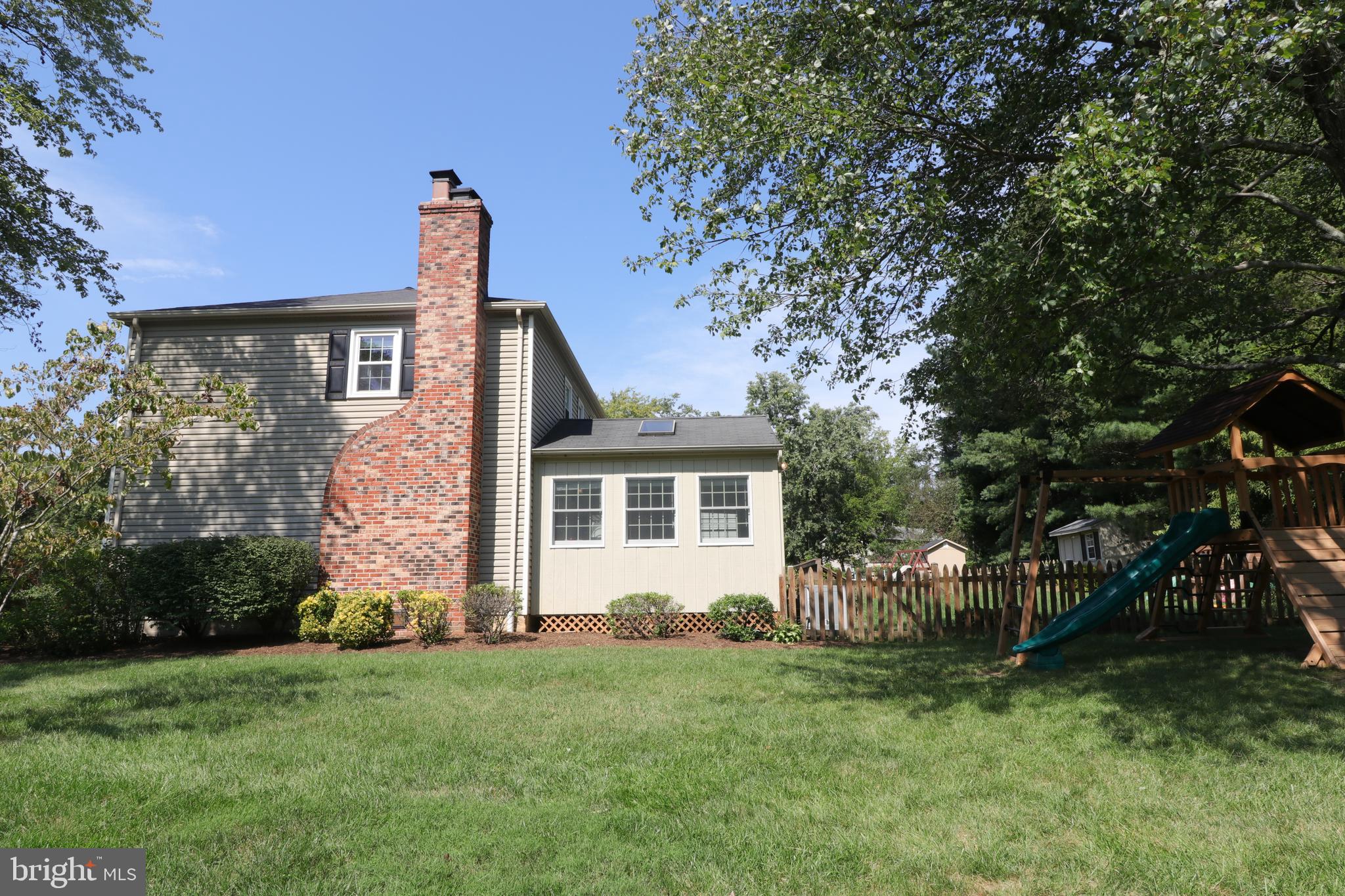 9320 Winbourne Road Burke, VA 22015 - Photo 50 of 55 Large side yard facing the cul-de-sac.