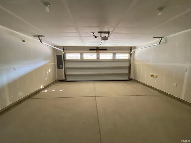 a picture of a bench in front of a building