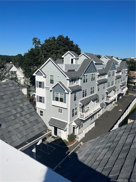 a aerial view of a house with a terrace