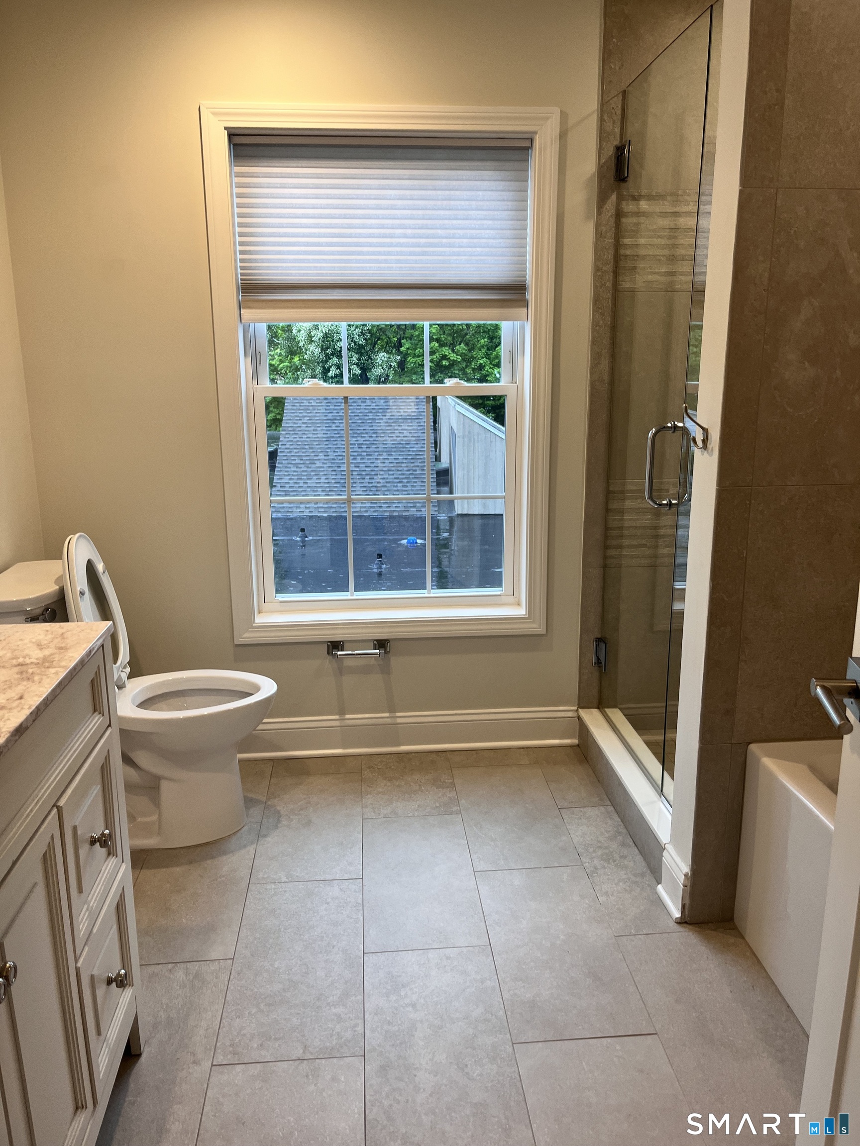 20 3rd Street, Unit 18 Stamford, CT 06905 - Photo 17 of 28 a bathroom with a toilet and a shower