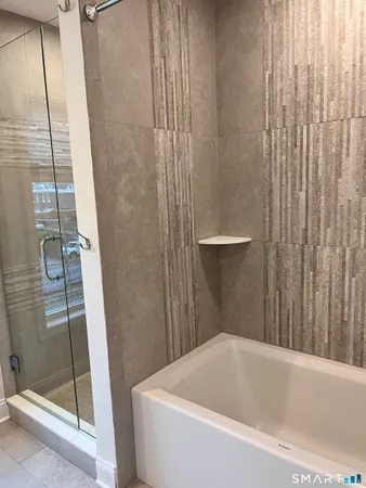 a bathroom with a bathtub