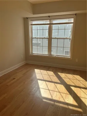 a view of empty room with windows