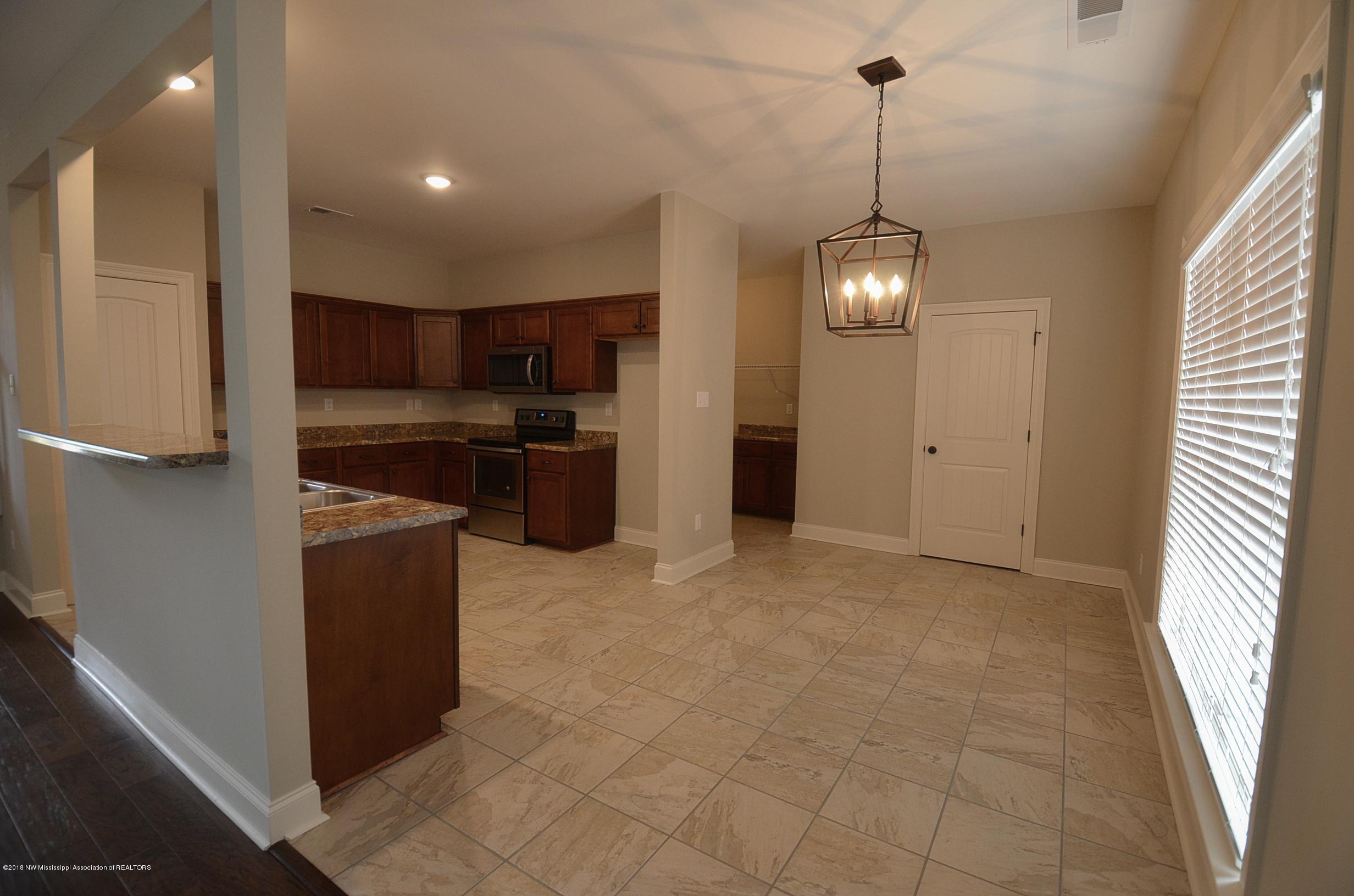 3050 Logan's Loop Hernando, MS 38632 - Photo 7 of 19 Kitchen and breakfast