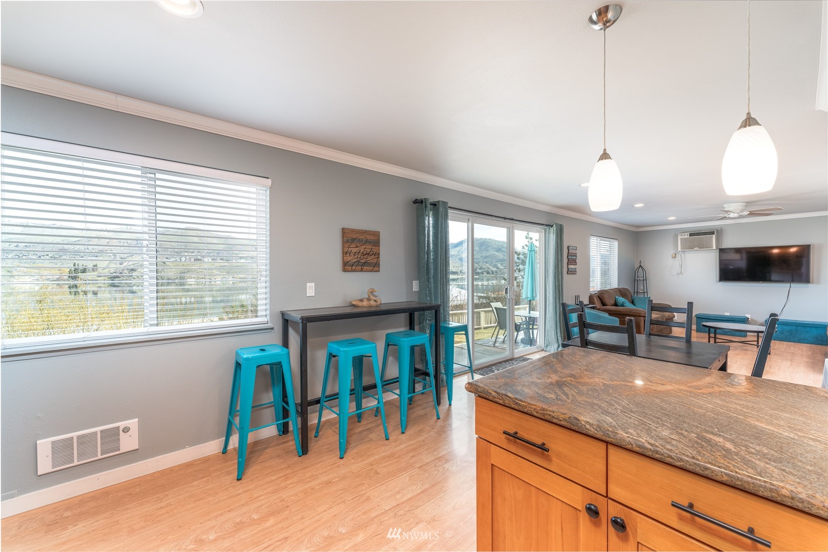 1902 West Prospect Street, Unit 112 Chelan, WA 98816 - Photo 16 of 40 a view of a dining room with furniture window and outside view
