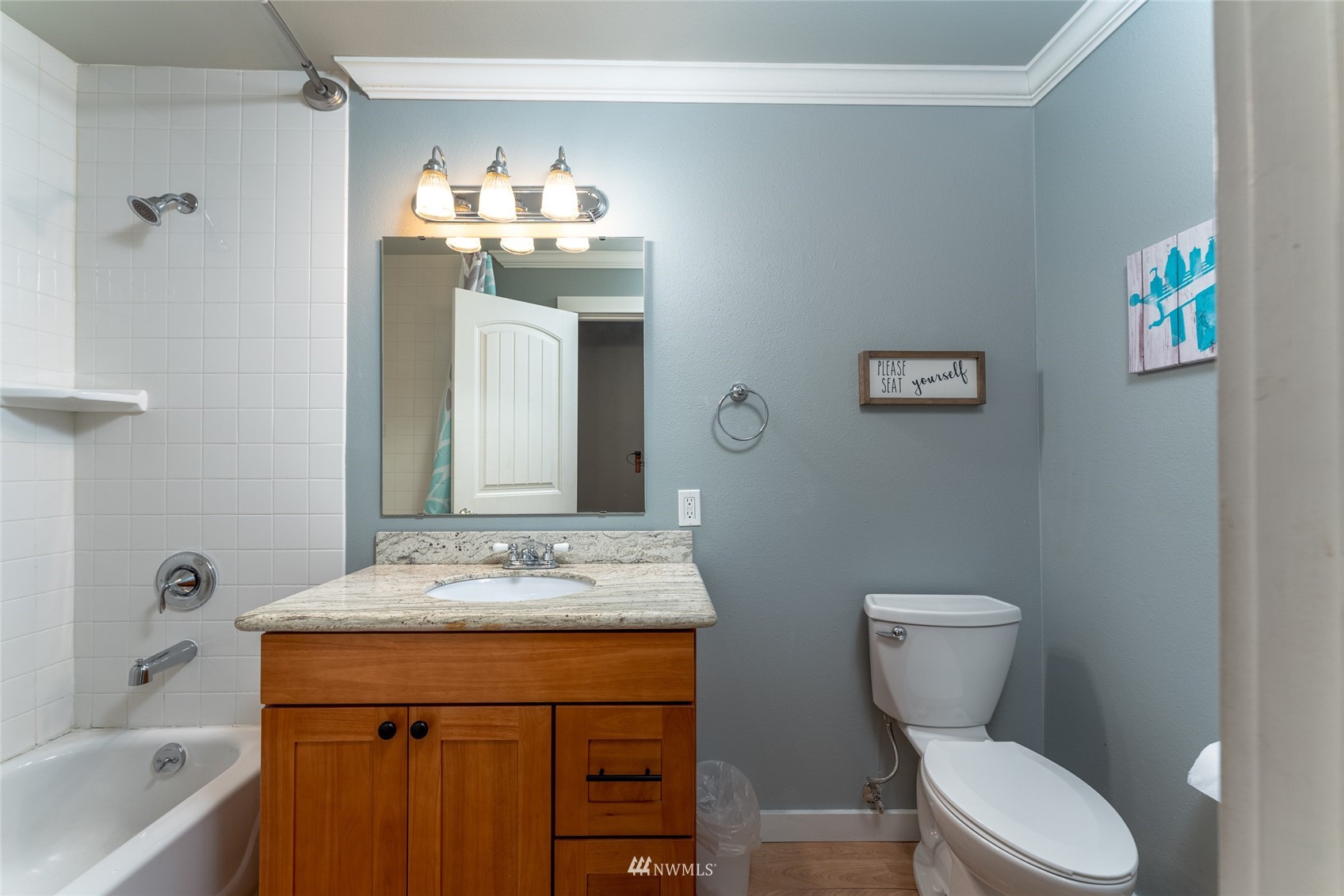 1902 West Prospect Street, Unit 112 Chelan, WA 98816 - Photo 24 of 40 a bathroom with a sink a toilet and shower