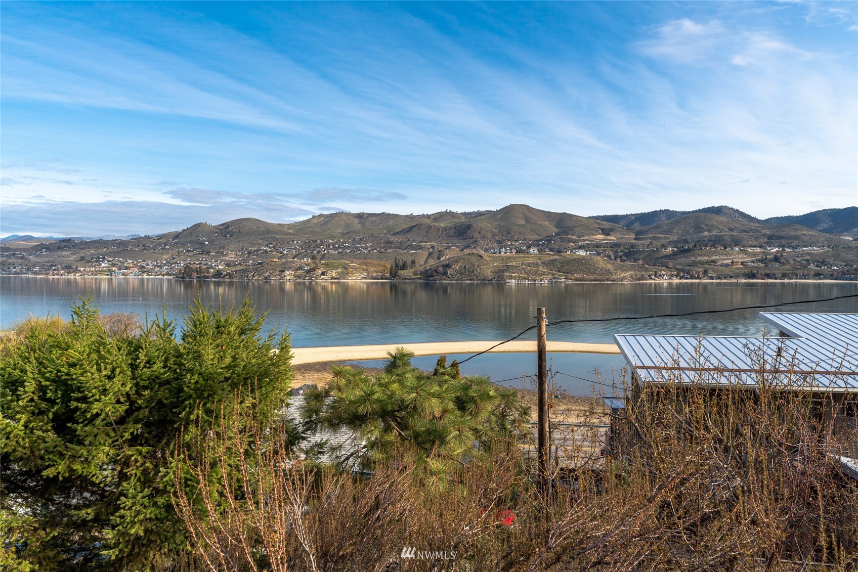 1902 West Prospect Street, Unit 112 Chelan, WA 98816 - Photo 3 of 40 a view of lake with mountain