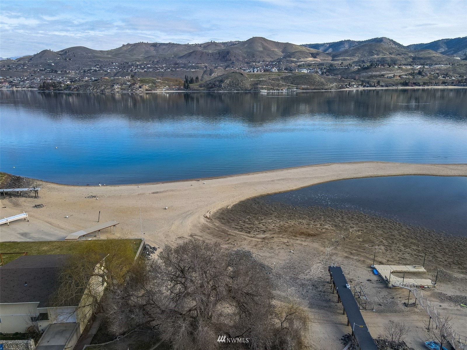 1902 West Prospect Street, Unit 112 Chelan, WA 98816 - Photo 31 of 40 a view of a lake with a mountain