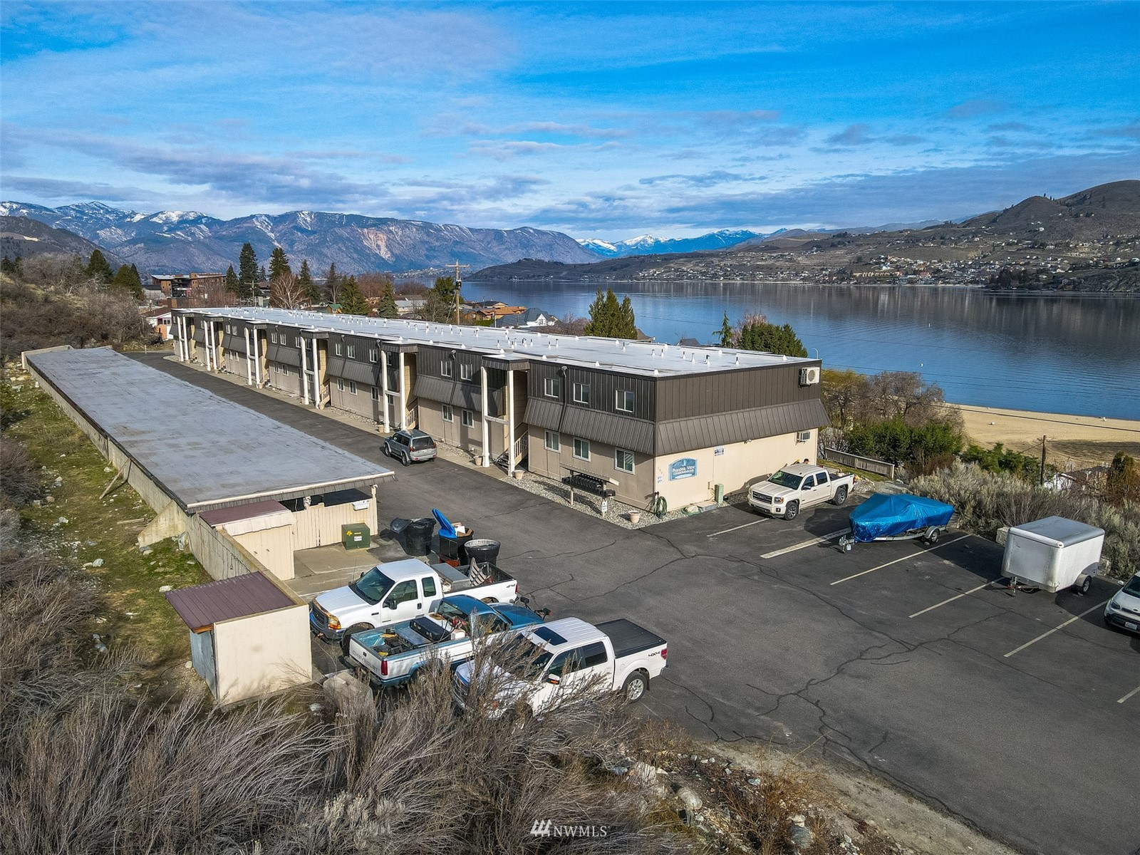 1902 West Prospect Street, Unit 112 Chelan, WA 98816 - Photo 4 of 40 an aerial view of a house with a ocean view