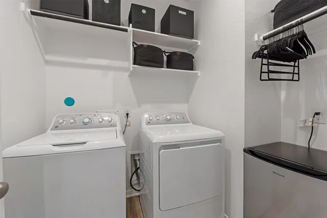 a utility room with dryer and washer