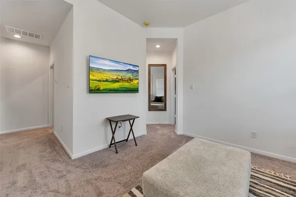 a view of a livingroom and furniture