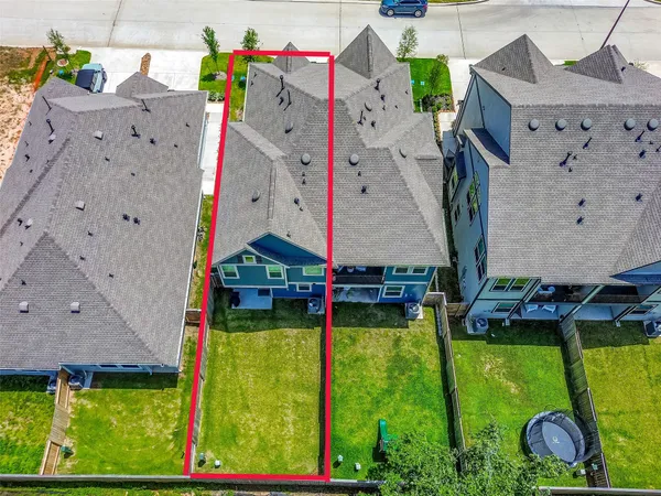 swimming pool view with a garden and plants