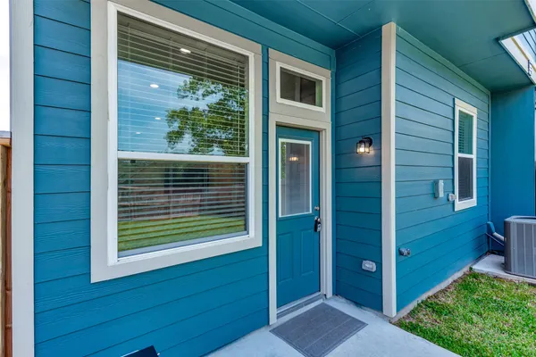 a view of a door and a window